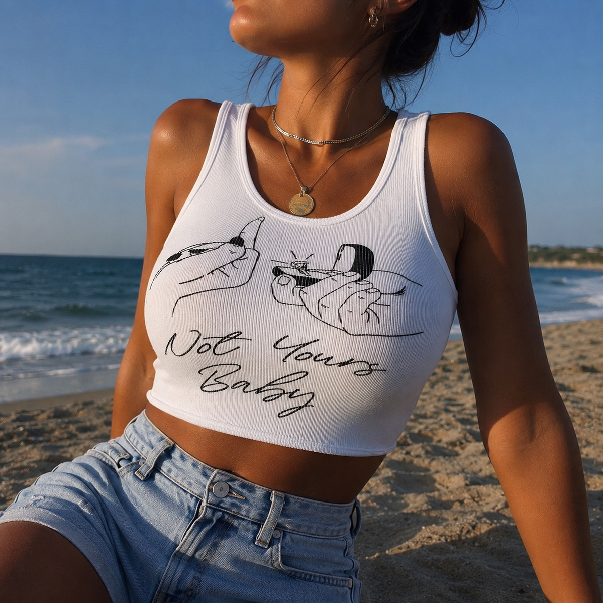 Top ultra court avec imprimé graphique « Not Your Baby »